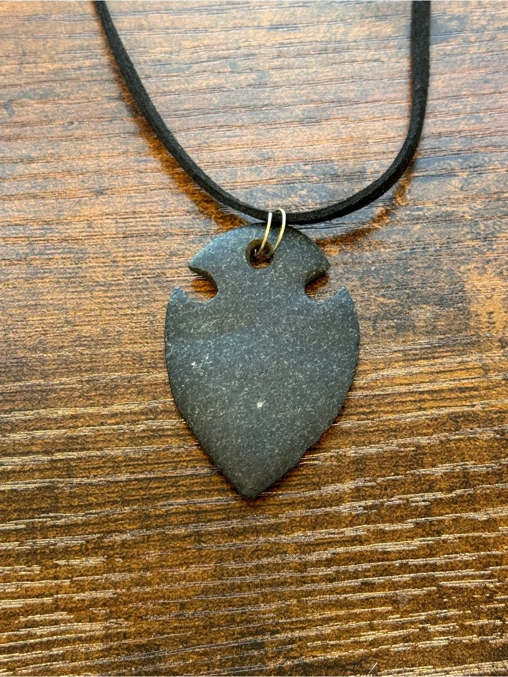 Handmade Dark Gray Granite Stone Arrowhead Pendant on Black Suede Cord